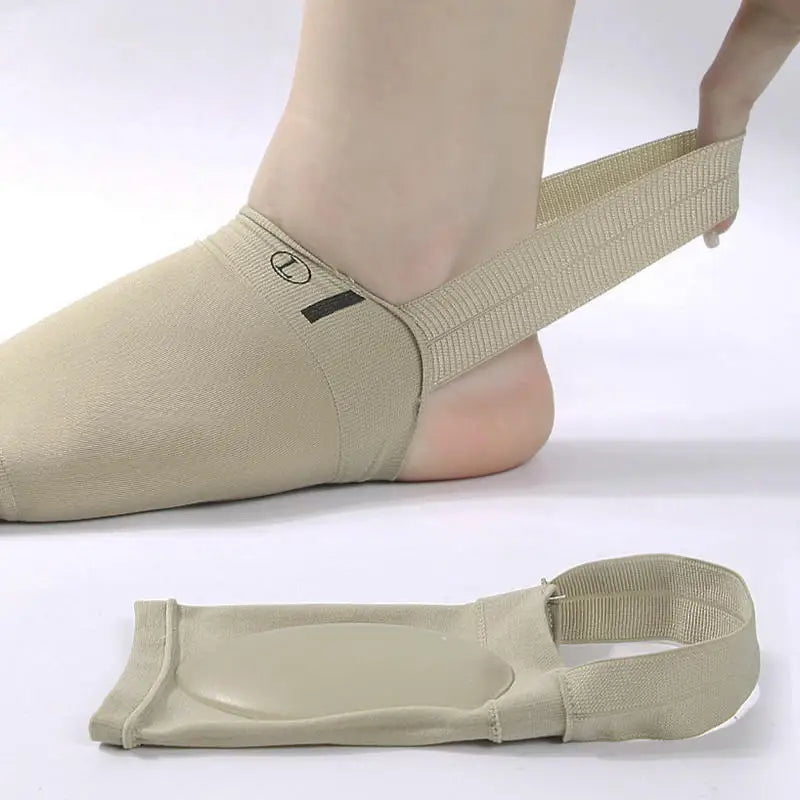 Beige ankle support brace worn by a person on a white background