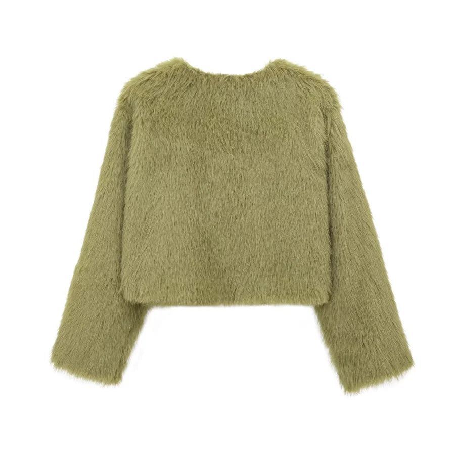 Green fuzzy sweater on a white background