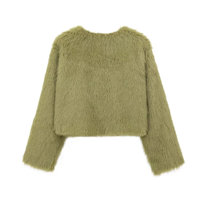 Green fuzzy sweater on a white background