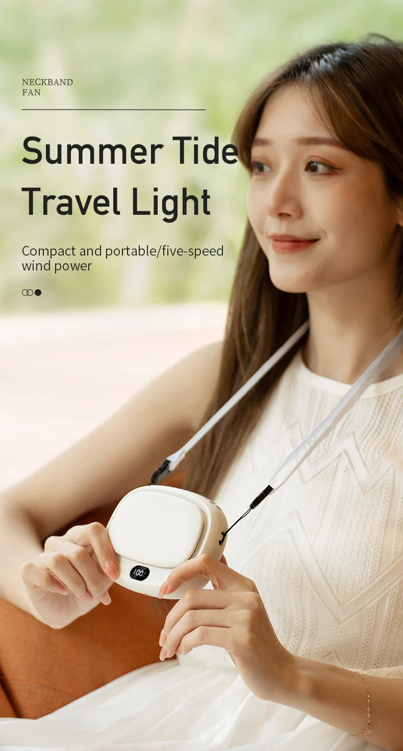 Person using Neck Hanging Mini Fan in a cozy indoor setting, emphasizing its portable nature.