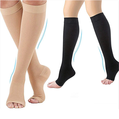 Beige and black compression socks on a white background