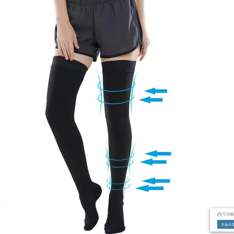 Person wearing black knee-high socks with blue arrows indicating compression points on a white background