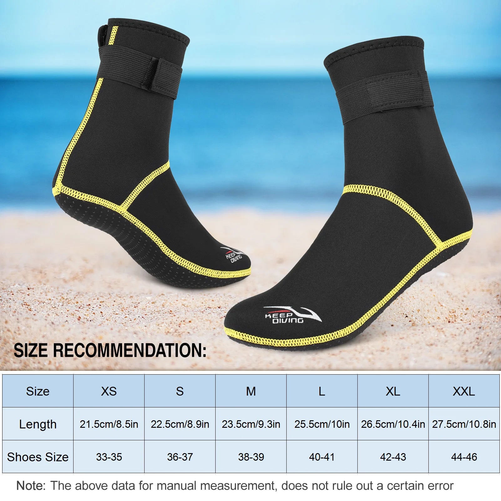 Black beach shoes with yellow trim on a sandy background