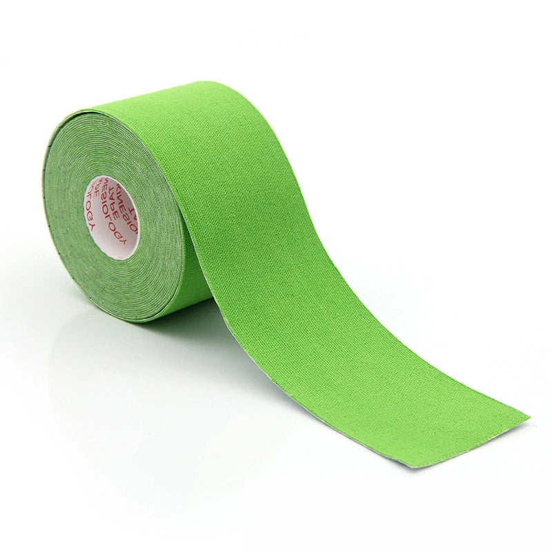 Roll of green tape on a white background